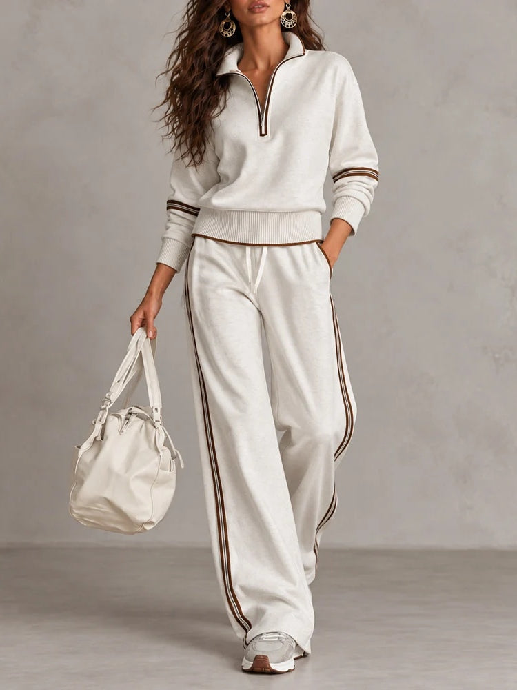 Conjunto blanco de sudadera de canalé con media cremallera y pantalón de pierna ancha bicolor