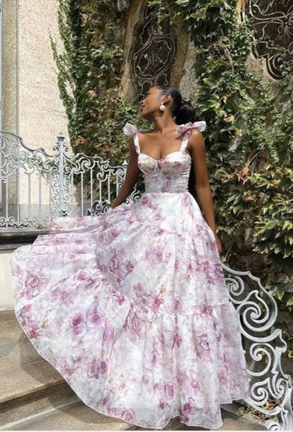 Vestido largo de organza con estampado floral y tirantes anudados