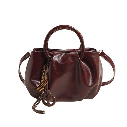 Bolso bandolera ligero plisado tipo nube