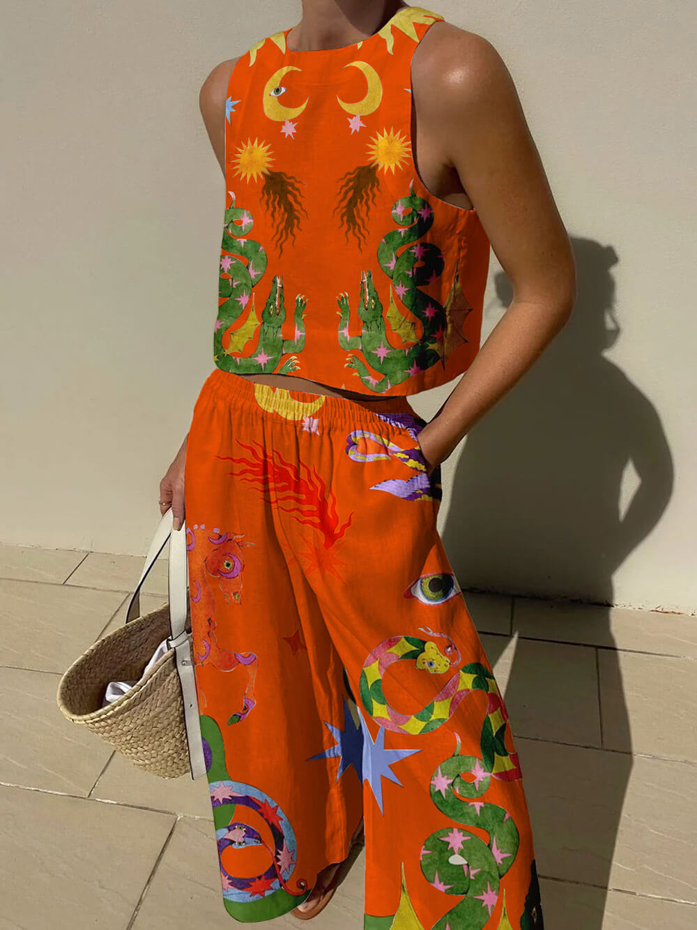 Conjunto de top de tirantes estampado y pantalón de cintura elástica con bolsillos