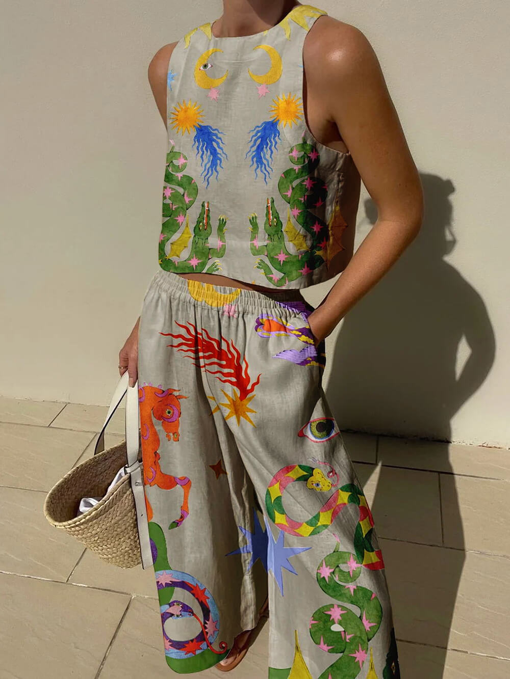 Conjunto de top de tirantes estampado y pantalón de cintura elástica con bolsillos