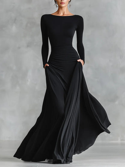 Vestido largo negro de crepé plisado con escote barco