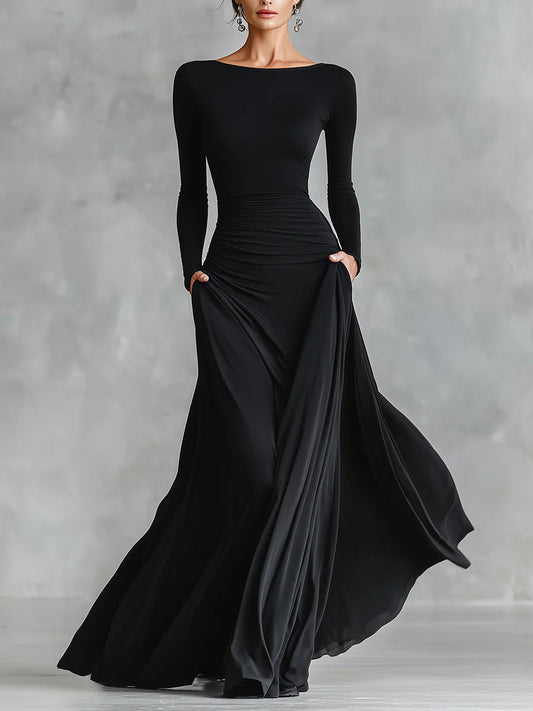 Vestido largo negro de crepé plisado con escote barco