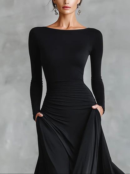 Vestido largo negro de crepé plisado con escote barco