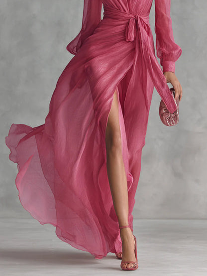 Elegante vestido largo de gasa rosa con cuello en V y lazada en la cintura