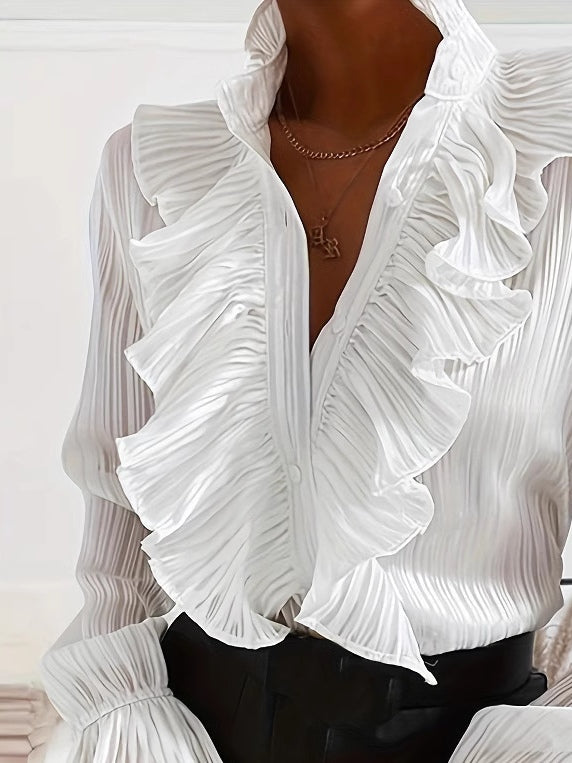 Camisa blanca de manga larga con volantes