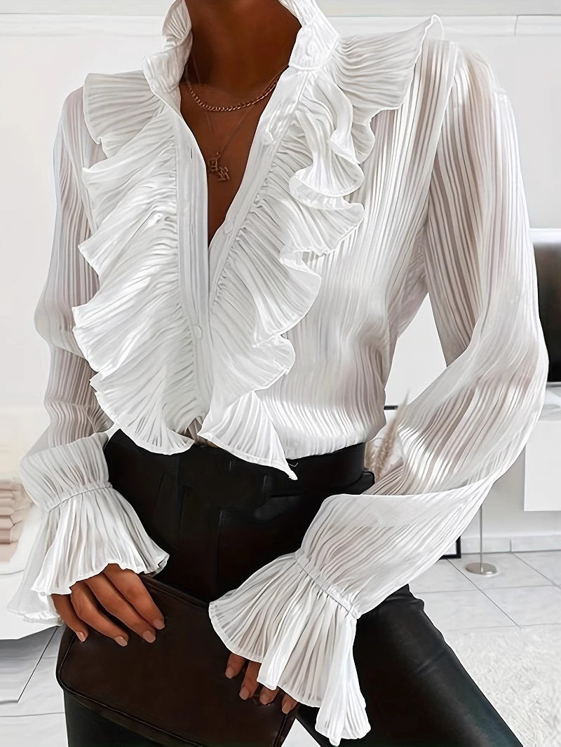 Camisa blanca de manga larga con volantes