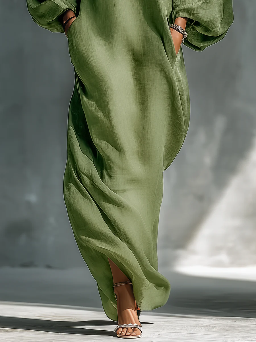 Vestido largo verde de hombros descubiertos con mangas abullonadas oversize