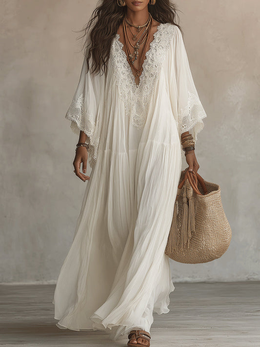 Vestido maxi de gasa blanco con encaje, escote en V y mangas murciélago