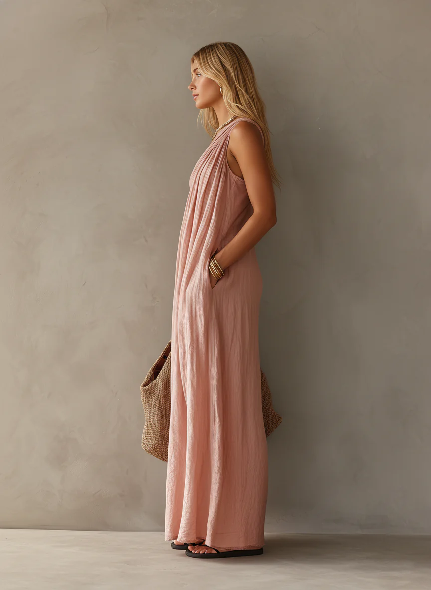 Elegante vestido largo rosa asimétrico sin mangas