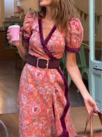 Elegante vestido largo rosa de manga corta con estampado floral