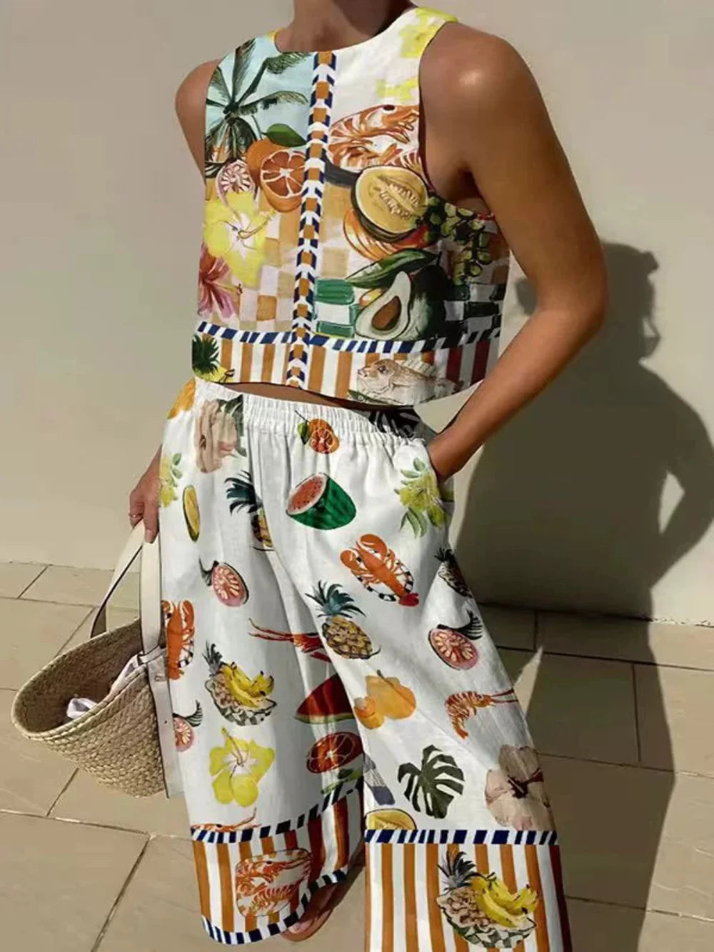 Conjunto de top de tirantes estampado y pantalón de cintura elástica con bolsillos