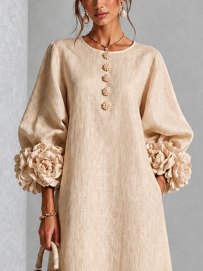 Vestido midi floral beige abotonado con llamativos puños florales