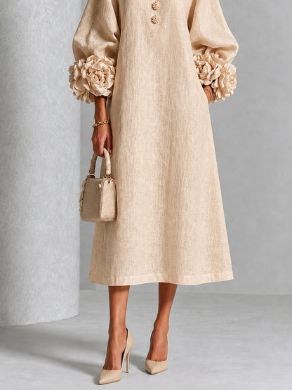 Vestido midi floral beige abotonado con llamativos puños florales