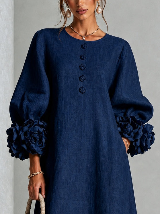 Vestido midi floral azul marino abotonado con llamativos puños florales