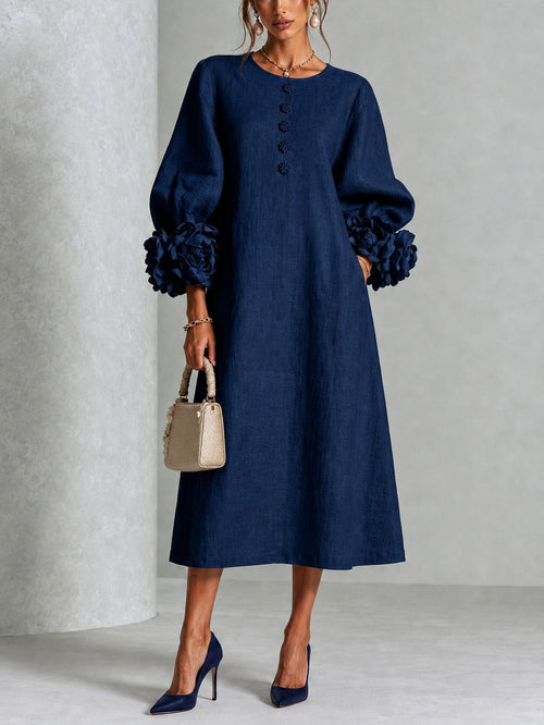 Vestido midi floral azul marino abotonado con llamativos puños florales