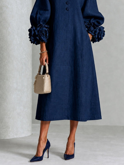 Vestido midi floral azul marino abotonado con llamativos puños florales