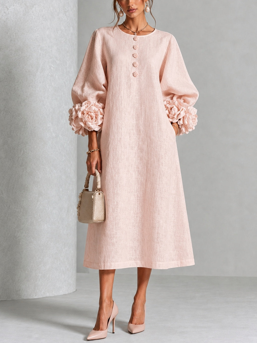 Vestido midi floral rosa abotonado con llamativos puños florales