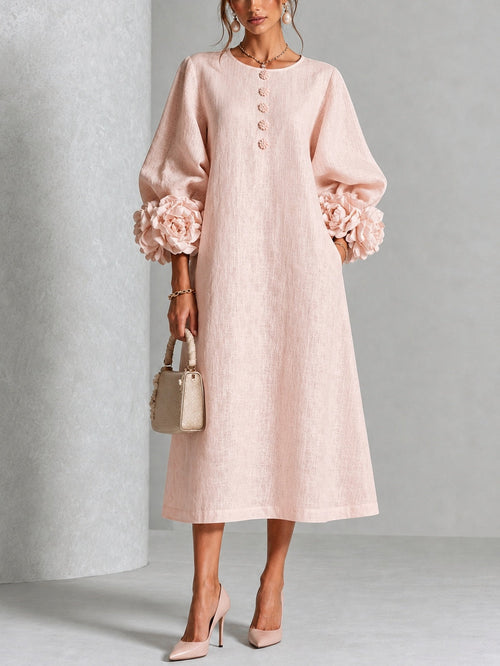 Vestido midi floral rosa abotonado con llamativos puños florales