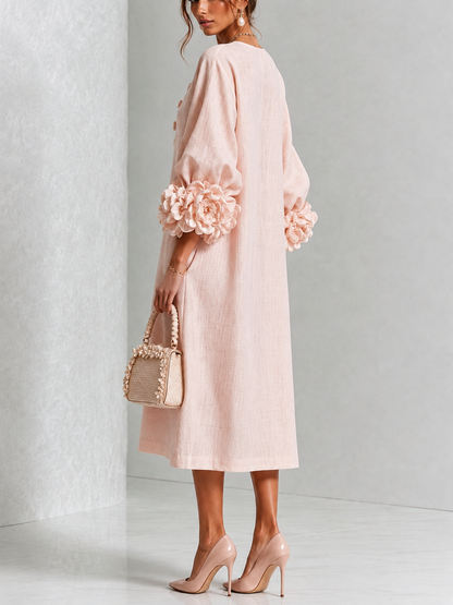 Vestido midi floral rosa abotonado con llamativos puños florales
