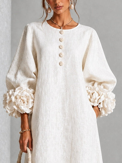 Vestido midi floral blanco abotonado con llamativos puños florales