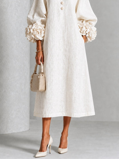 Vestido midi floral blanco abotonado con llamativos puños florales