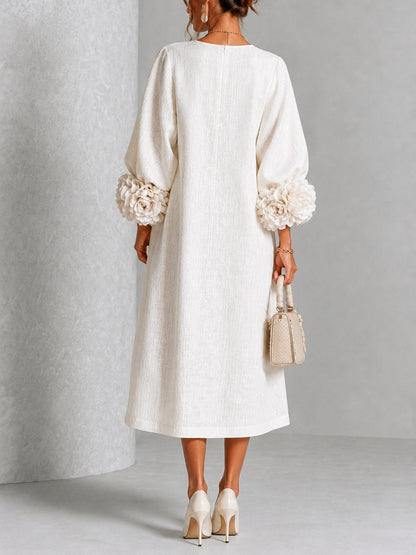 Vestido midi floral blanco abotonado con llamativos puños florales