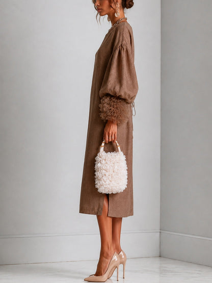 Vestido midi marrón con cintura ajustable, manga farol y puños de volante plisado