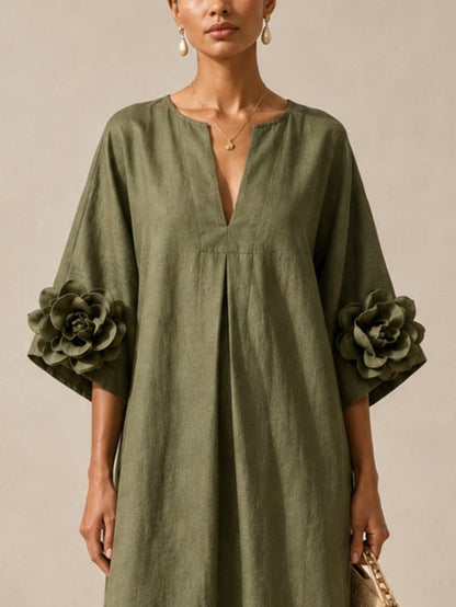 Vestido midi verde oliva con escote en V y llamativos puños florales