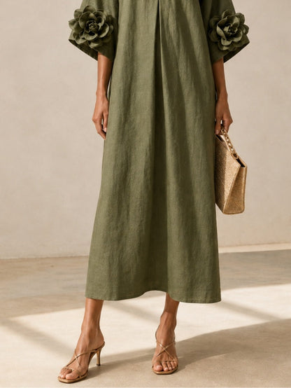 Vestido midi verde oliva con escote en V y llamativos puños florales