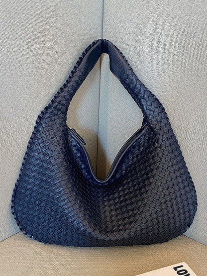 Bolso de piel trenzada a la moda