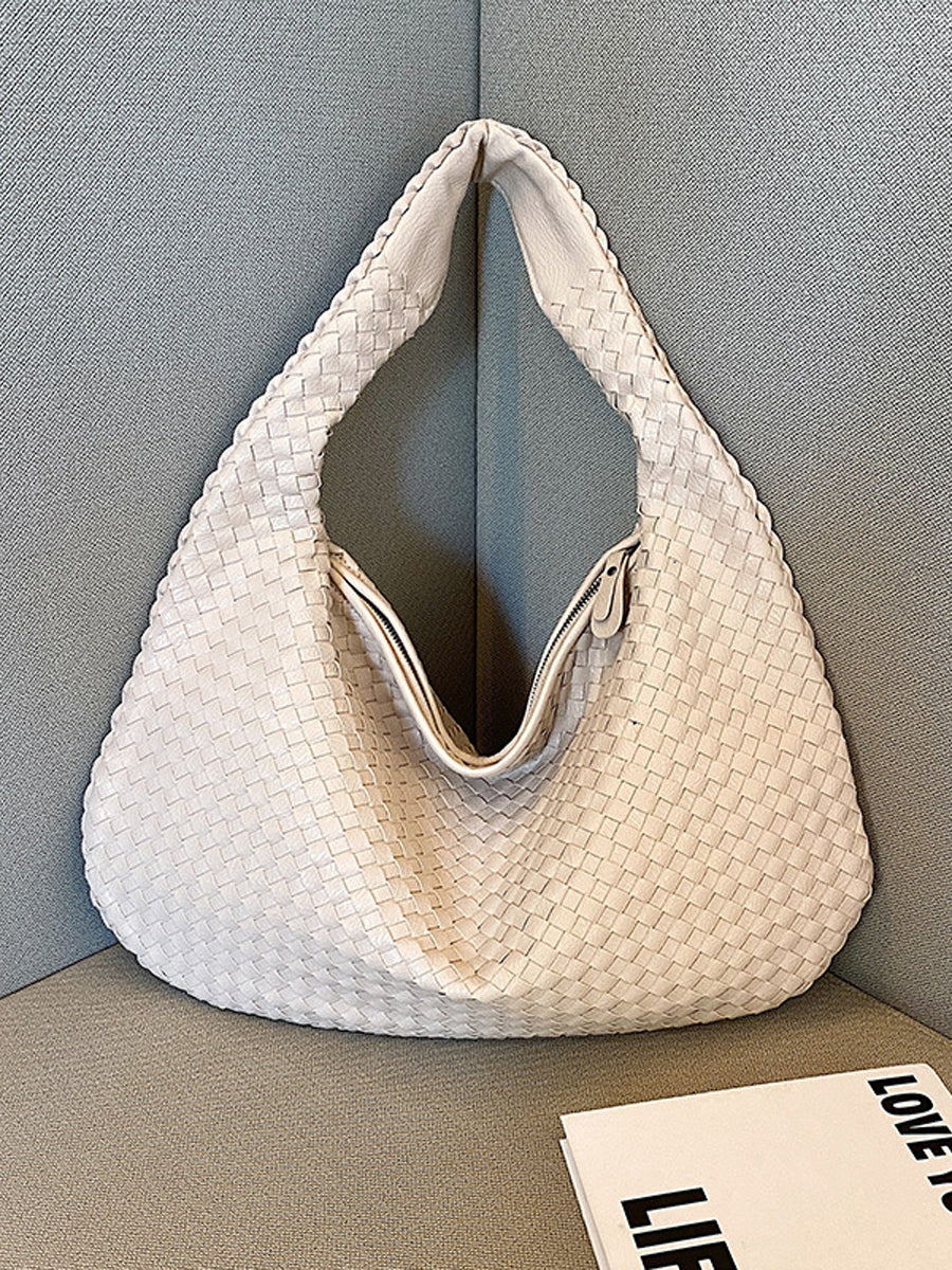 Bolso de piel trenzada a la moda