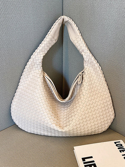 Bolso de piel trenzada a la moda