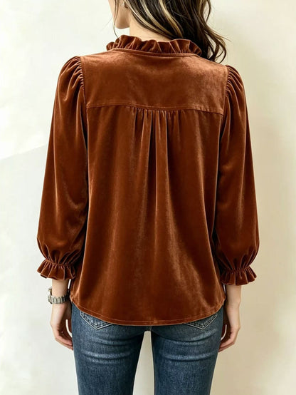 Camisa de terciopelo con volantes, cuello en V y manga abullonada