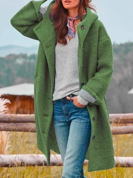 Chaqueta holgada con capucha y botonadura sencilla