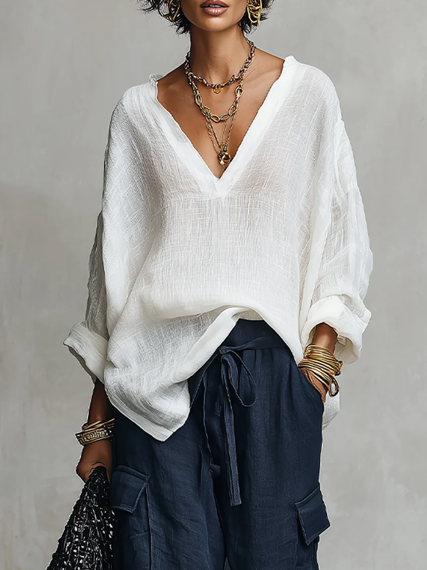 Conjunto de dos piezas: blusa blanca de lino con cuello en V y pantalón ancho azul marino