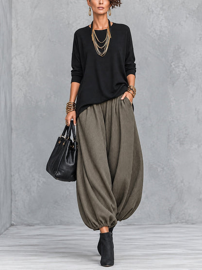 Conjunto de tres piezas verde oliva: cárdigan asimétrico, top y pantalón farol