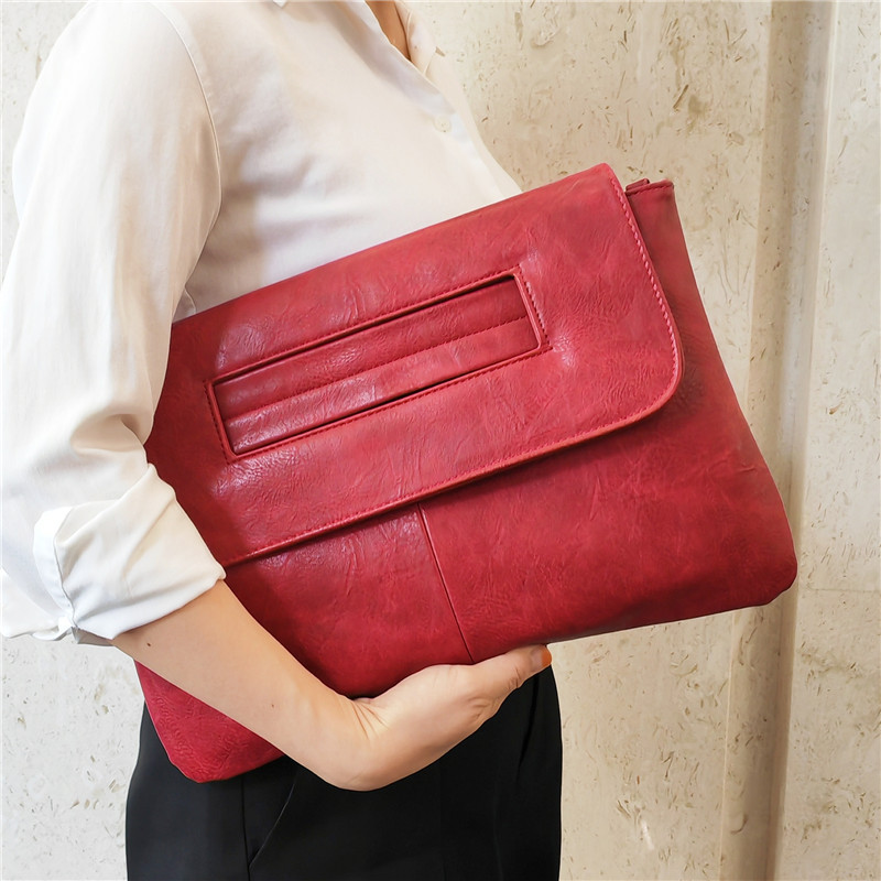 Bolso clutch magnético de gran capacidad con correa bandolera