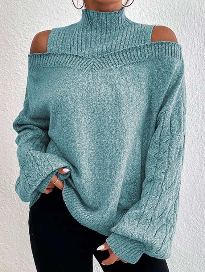 Jersey holgado de manga larga con cuello alto y hombros descubiertos