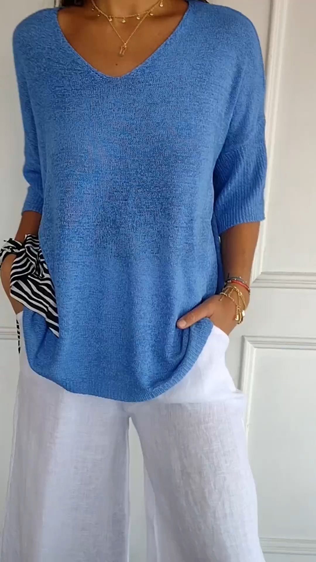 Top de punto liso con cuello en V