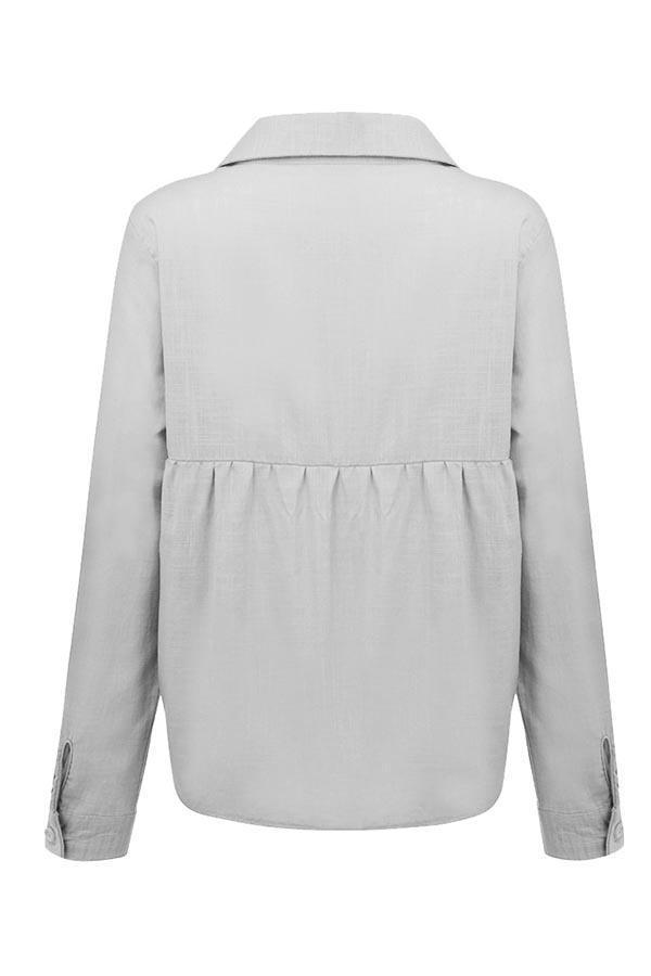 Blusa casual lisa con botones y cuello camisero