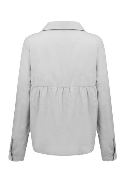 Blusa casual lisa con botones y cuello camisero