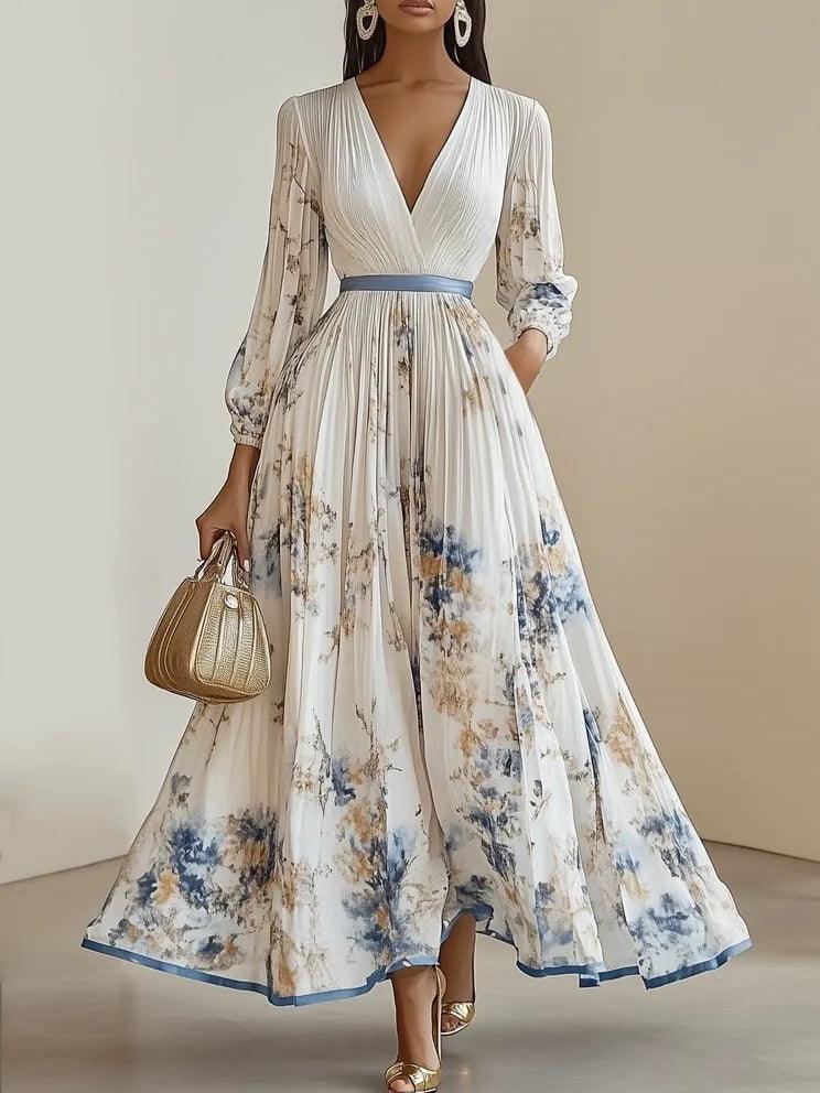 Vestido largo blanco de gasa plisada con flores, cuello en V y manga larga abullonada