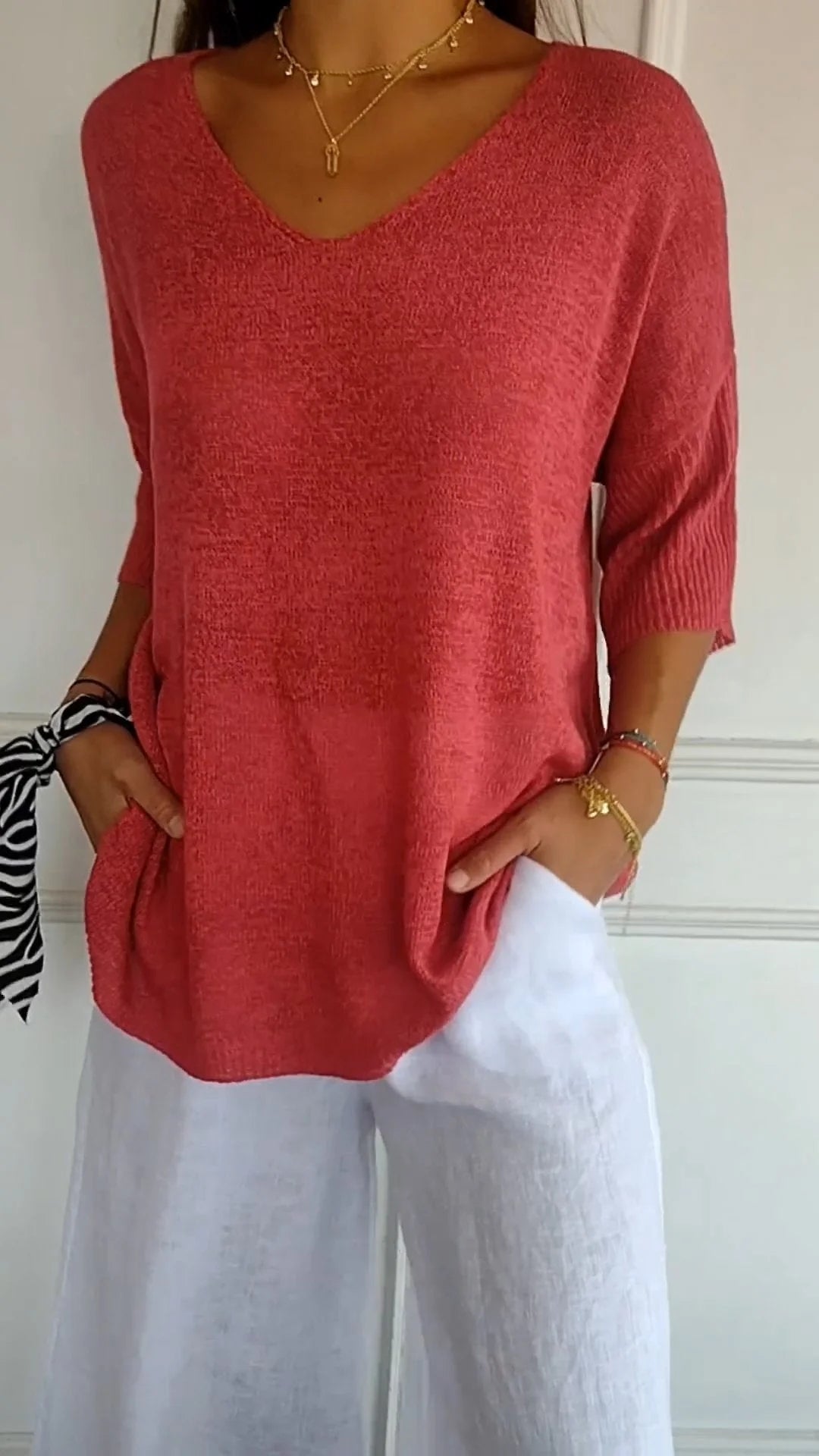 Top de punto liso con cuello en V