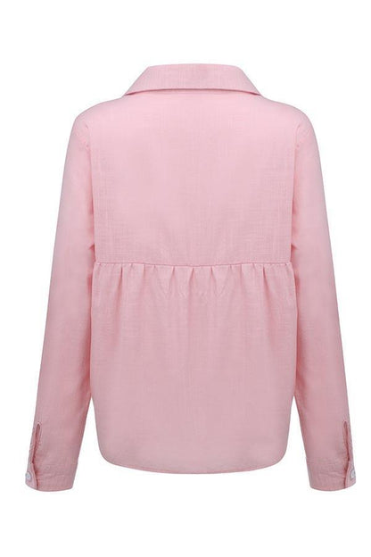 Blusa casual lisa con botones y cuello camisero