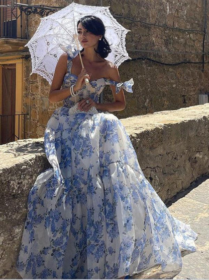 Vestido largo de organza con estampado floral y tirantes anudados