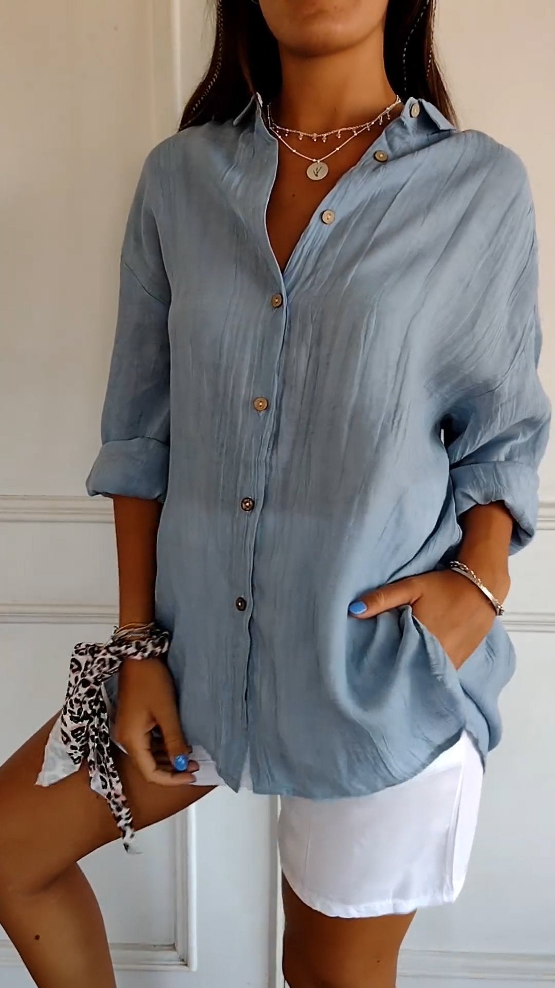 Camisa plisada con solapa y botones
